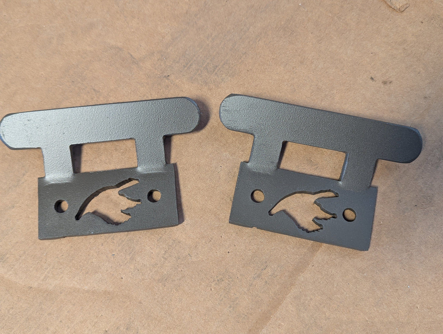 Two T-Rail Cleats